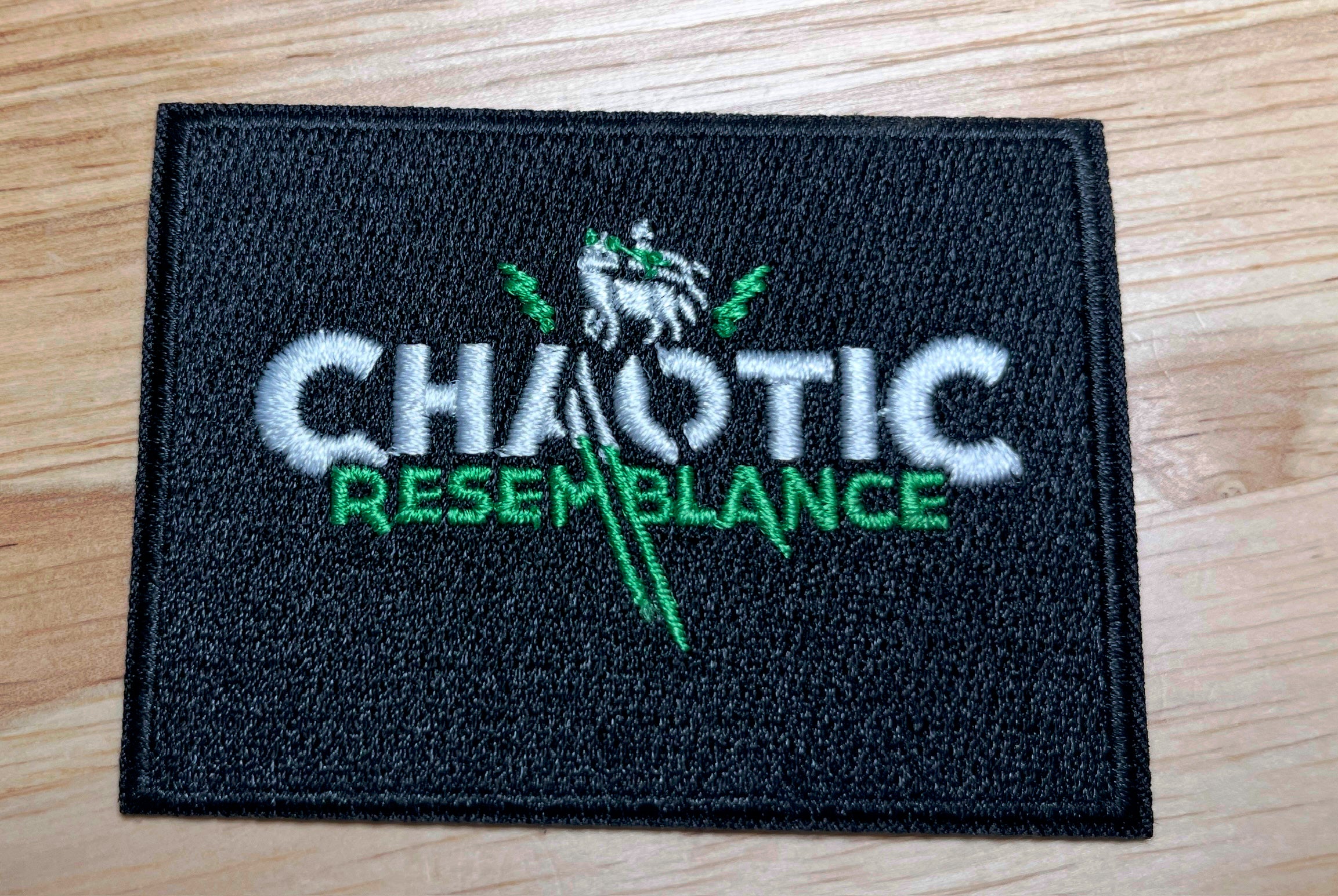 New Chaotic Resemblance, patch, green and white logo